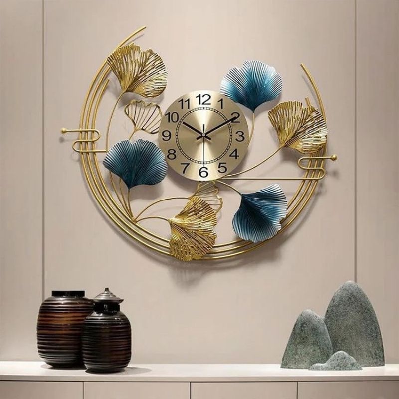 Metal Wall Clock by Hansart Total Wall Coverage Area: 32 x 32 Inches Expertly crafted by artisans in Jodhpur, India Made of Wrought Iron Metal It feature an anti-rust powder coating for a long-lasting finish Finished with a spray paint and lacquer for a smooth and polished look Perfect for your living room, bedroom, hall, office reception, guest room, and hotel reception The product is packed by professionals for safe delivery Designed to make your home look complete