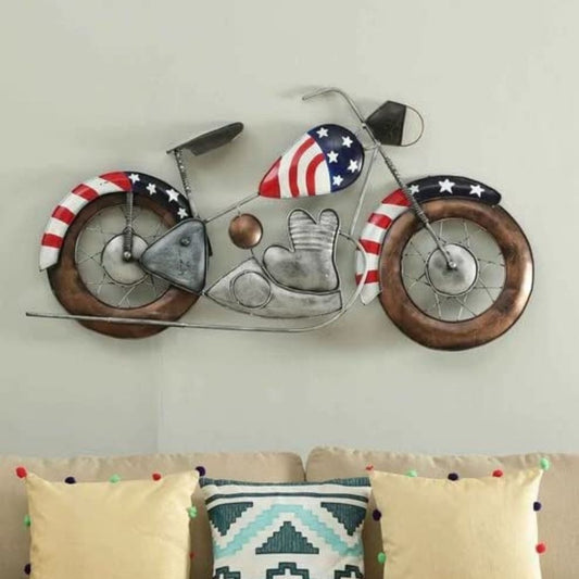 Add a stylish touch to your living room with this 44 x 27 inch designer US bike wall décor. Carefully crafted from premium-quality iron metal, it's sure to bring a touch of instant charm to any space you place it in. Make a statement Crafted with an anti rust powder coating for long-lasting durability and crafted to evoke a classic luxury feel, its timeless lines will bring a touch of sophistication to any wall. Show off your stylish side with this designer US Bike Wall Décor. metal wall hanging by hansart