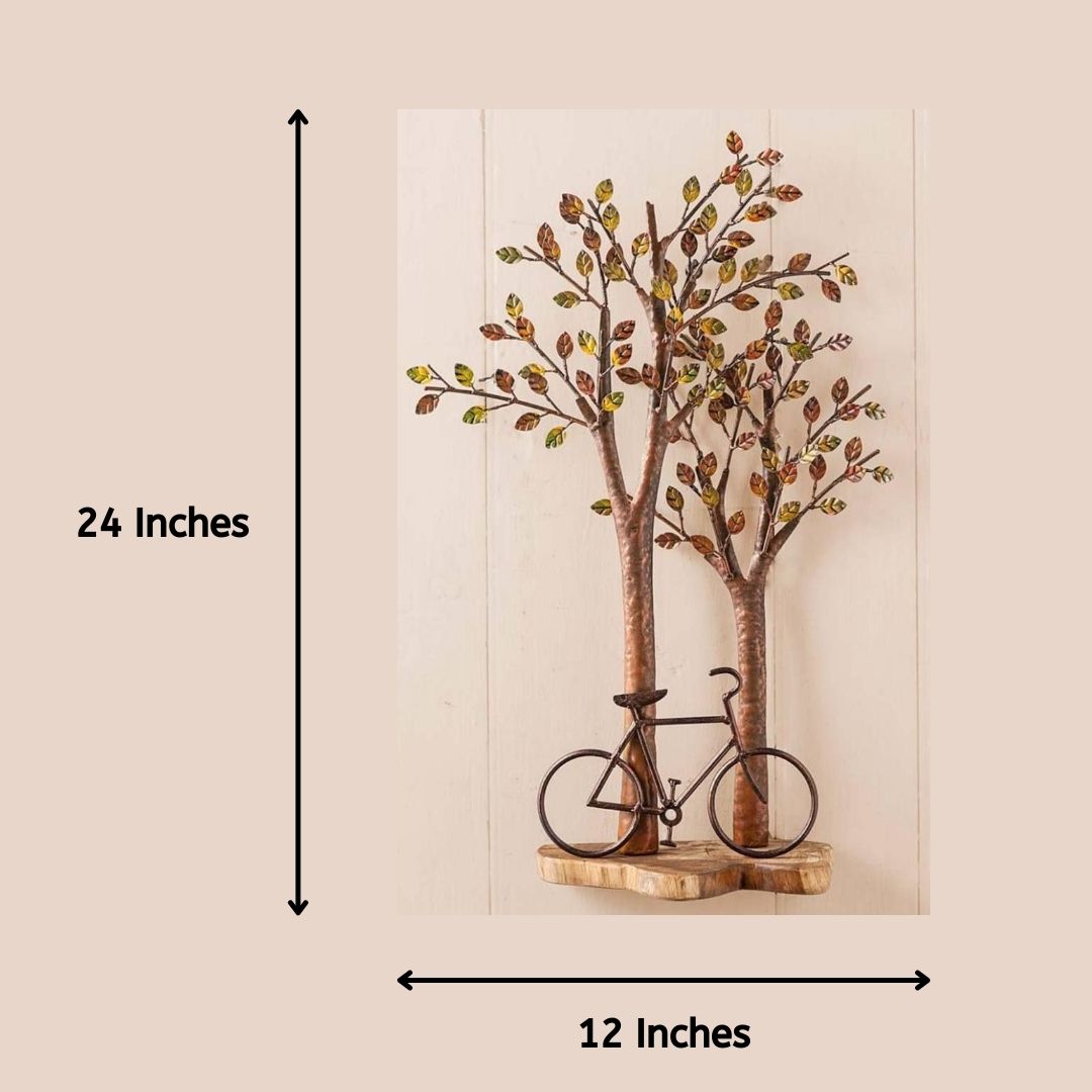 Cycle Under a Tree Metal Wall Art for Living Room (24 x 12 Inches)-Home Decoration-Metal Wall Tree by Hansart Made of Premium-Quality Iron Metal Perfect for your living room, bedroom, hall, office reception, guest room, and hotel reception The product is packed by professionals for safe delivery Designed to make your home look complete "Hansart Made In India because India itself is an art".