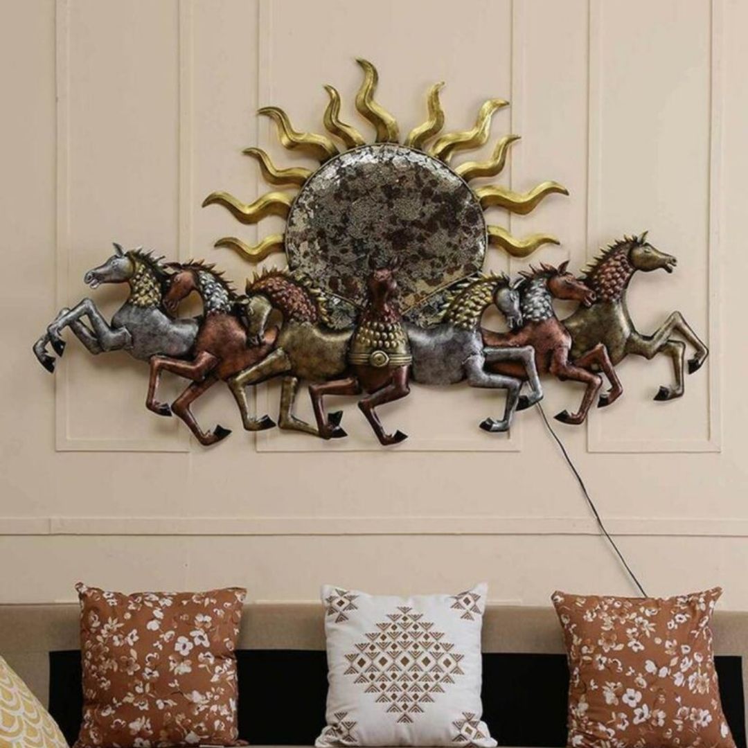 This 7 Horses with Sun Metal Wall Art by Hansart is a beautiful, eye-catching piece of metal décor that will transform any room. Made of High-Quality Iron Metal Anti-rust powder coating used for long lasting finish Hanging Mechanism included Horse wall decor with led lighting Perfect for your living room, bedroom, hall, office reception, guest room, and hotel reception The product is packed by professionals for safe delivery Designed to make your home look complete Total Wall Coverage Area:  48 x 27 Inches