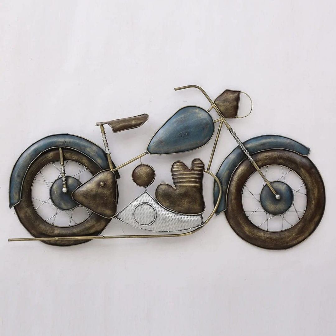 Add a stylish touch to your living room with this 44 x 27 inch designer bike wall décor. Carefully crafted from premium-quality iron metal, it's sure to bring a touch of instant charm to any space you place it in. Make a statement Crafted with an anti rust powder coating for long-lasting durability and crafted to evoke a classic luxury feel, its timeless lines will bring a touch of sophistication to any wall. Show off your stylish side with this designer Bike Wall Décor. Metal Wall Hanging By Hansart