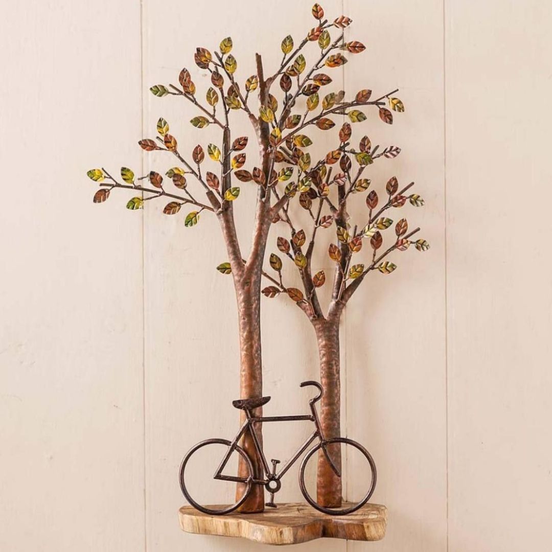 Cycle Under a Tree Metal Wall Art for Living Room (24 x 12 Inches)-Home Decoration-Metal Wall Tree by Hansart Made of Premium-Quality Iron Metal Perfect for your living room, bedroom, hall, office reception, guest room, and hotel reception The product is packed by professionals for safe delivery Designed to make your home look complete "Hansart Made In India because India itself is an art".