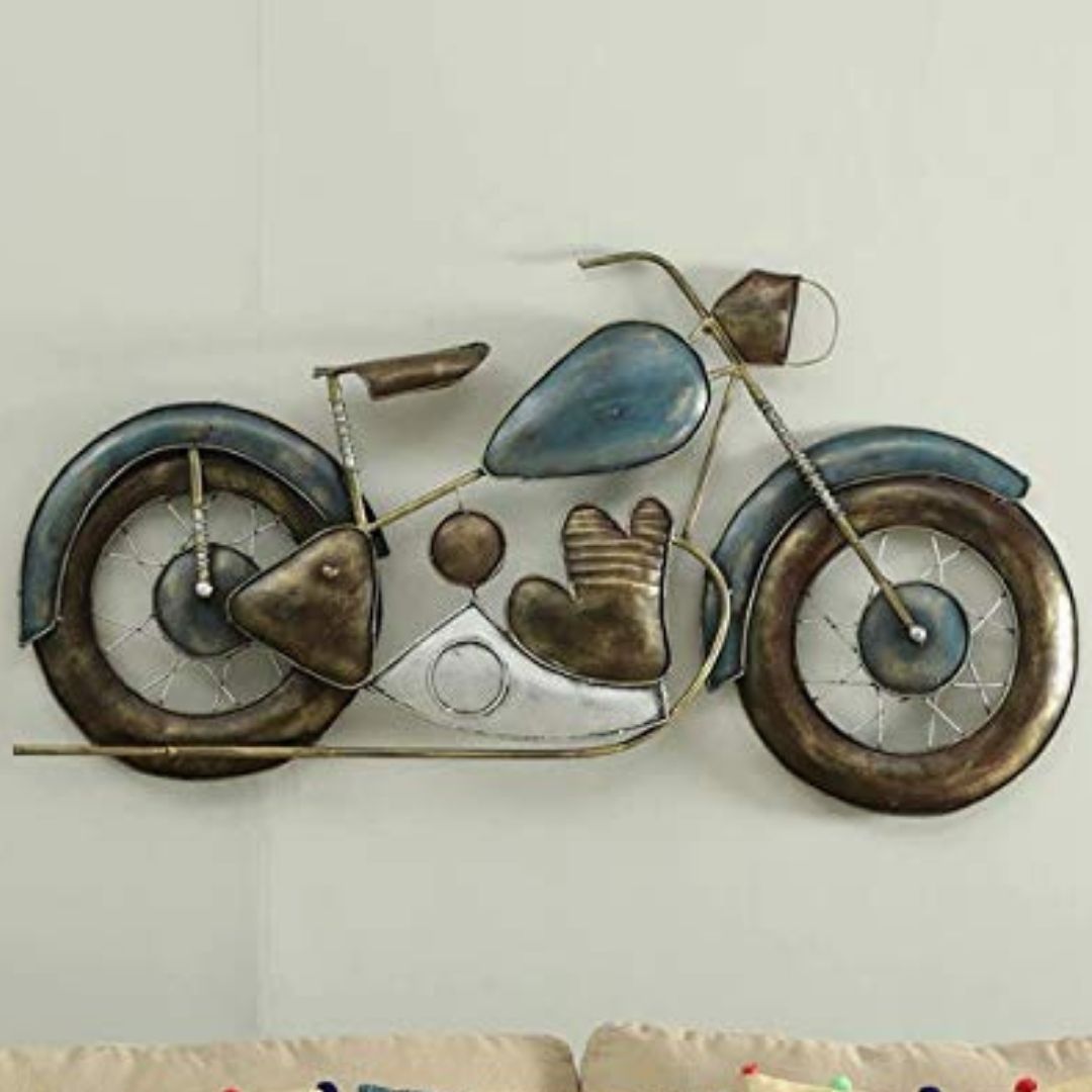 Add a stylish touch to your living room with this 44 x 27 inch designer bike wall décor. Carefully crafted from premium-quality iron metal, it's sure to bring a touch of instant charm to any space you place it in. Make a statement Crafted with an anti rust powder coating for long-lasting durability and crafted to evoke a classic luxury feel, its timeless lines will bring a touch of sophistication to any wall. Show off your stylish side with this designer Bike Wall Décor. Metal Wall Hanging By Hansart