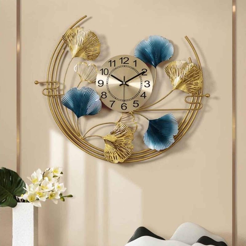 Metal Wall Clock by Hansart Total Wall Coverage Area: 32 x 32 Inches Expertly crafted by artisans in Jodhpur, India Made of Wrought Iron Metal It feature an anti-rust powder coating for a long-lasting finish Finished with a spray paint and lacquer for a smooth and polished look Perfect for your living room, bedroom, hall, office reception, guest room, and hotel reception The product is packed by professionals for safe delivery Designed to make your home look complete